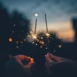 Two sparklers signifying new year's celebration